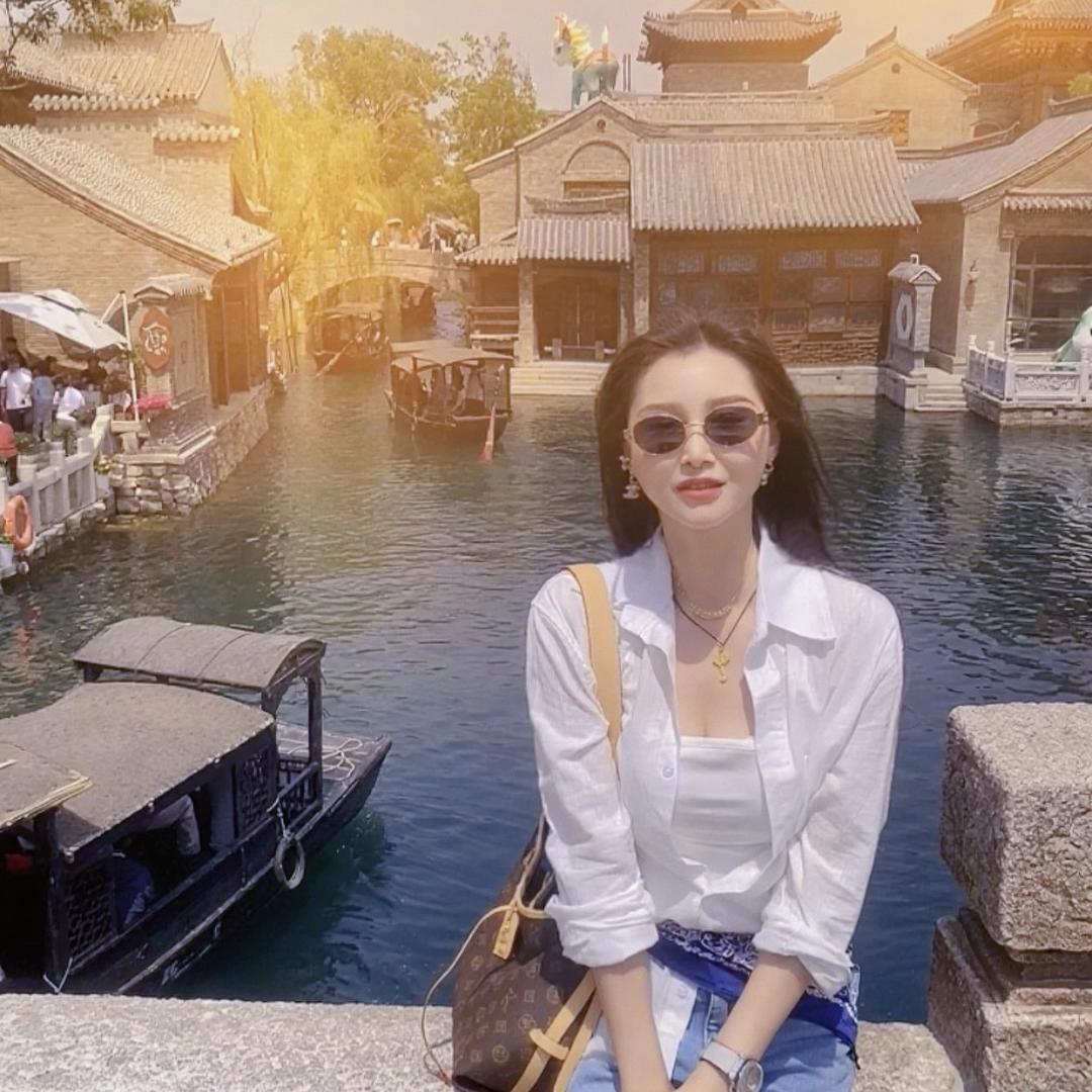 美美.