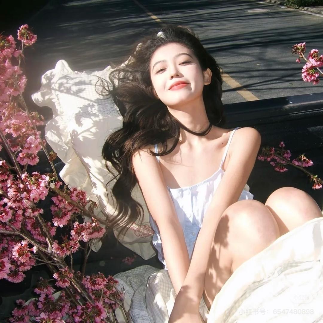 春媚.