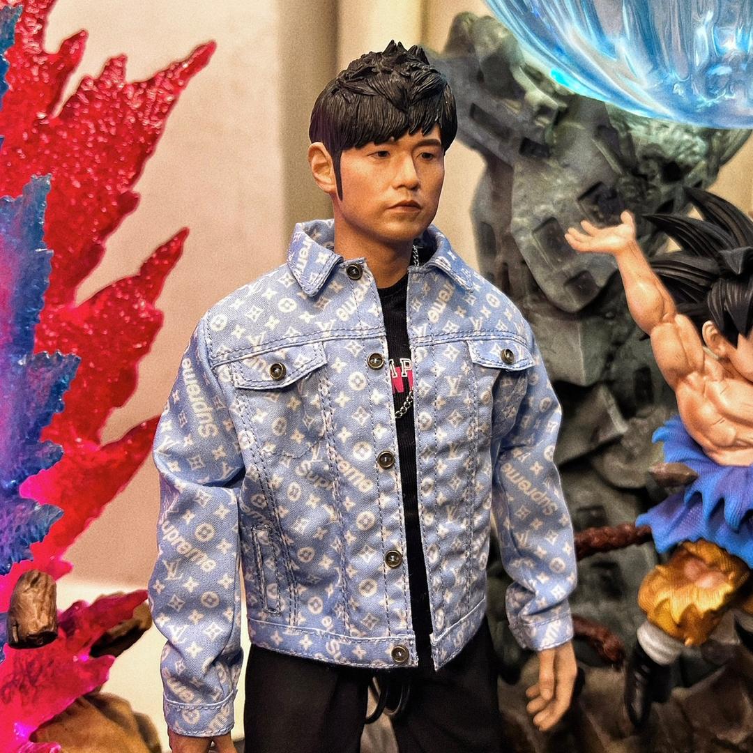 杰伦手中的奶茶