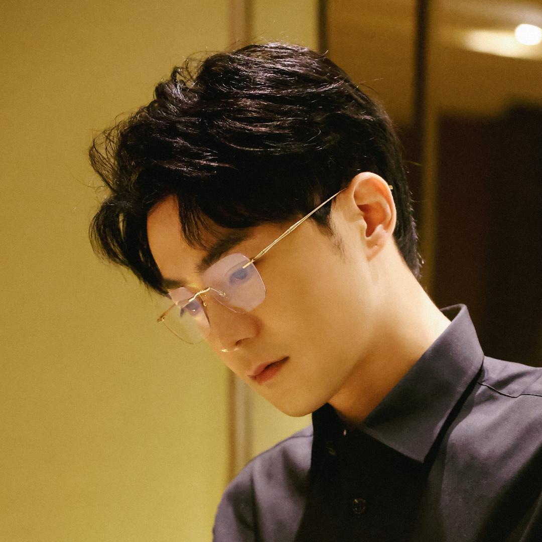 曲哲明