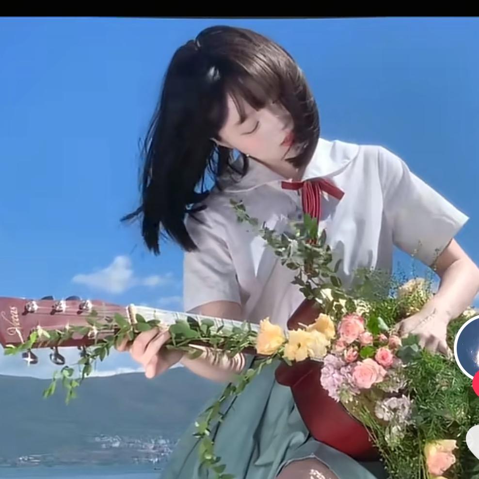 拿吉他种花