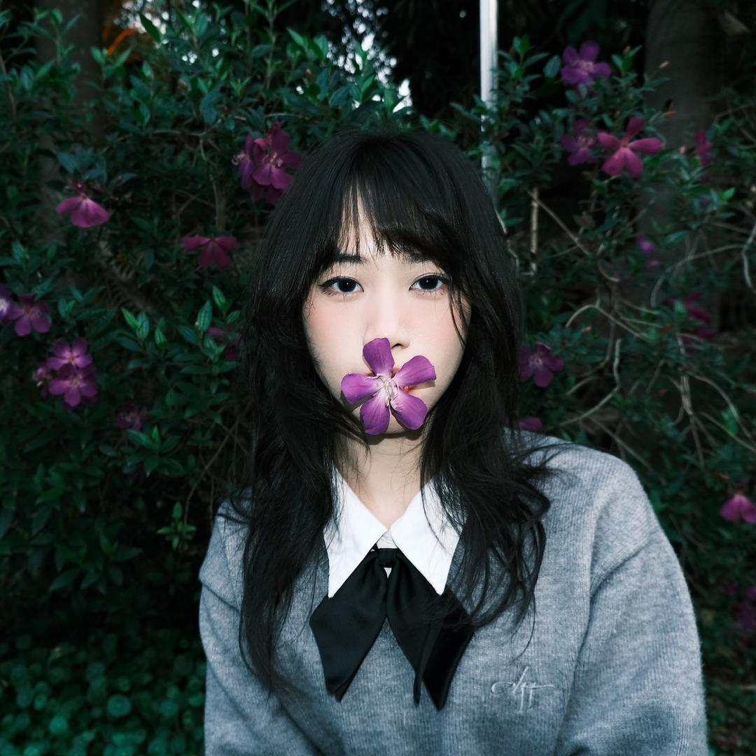 周屎妮