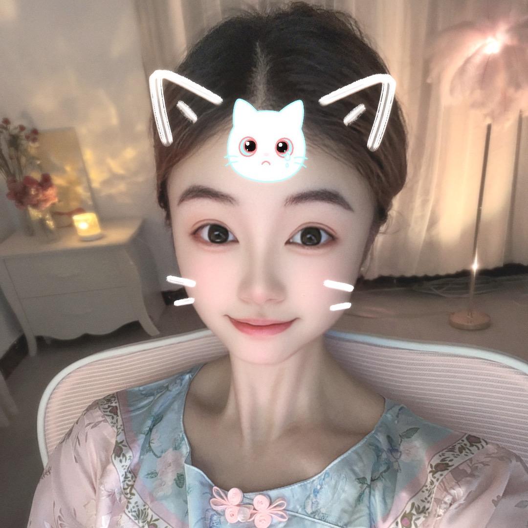 嫣然