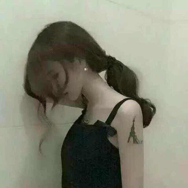 T.