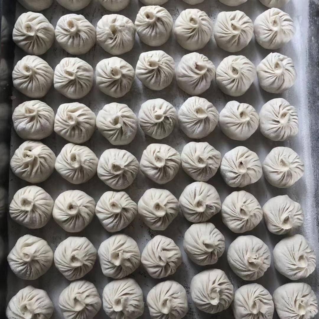 爱做包子的老太