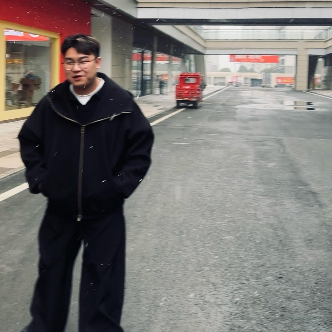 小毅.