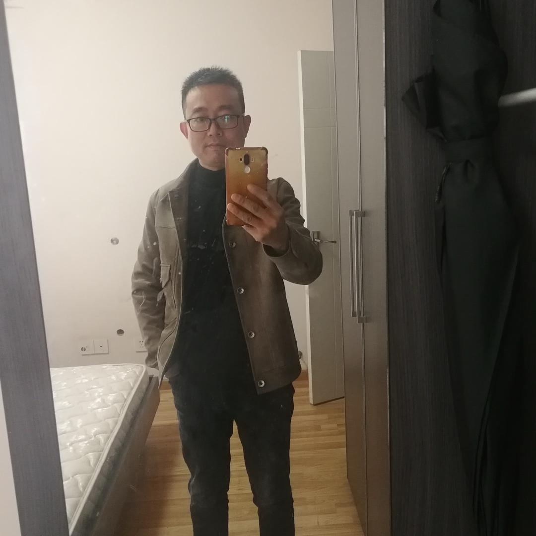钱军成