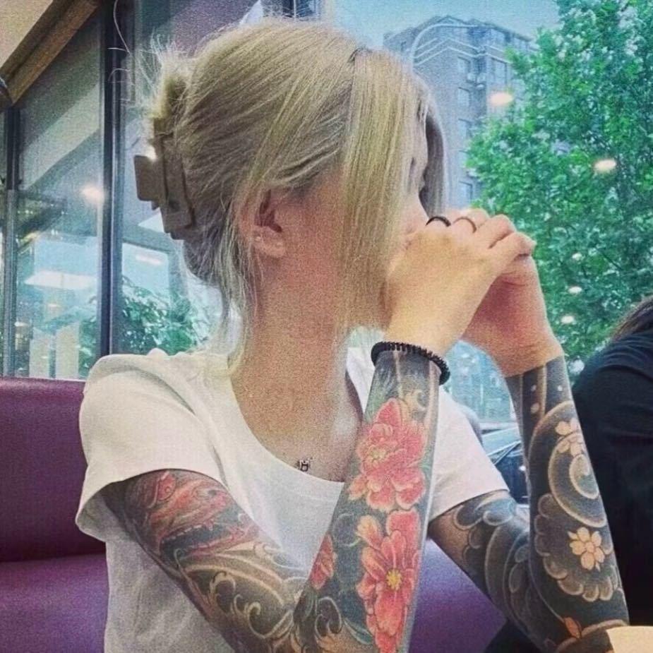 T.