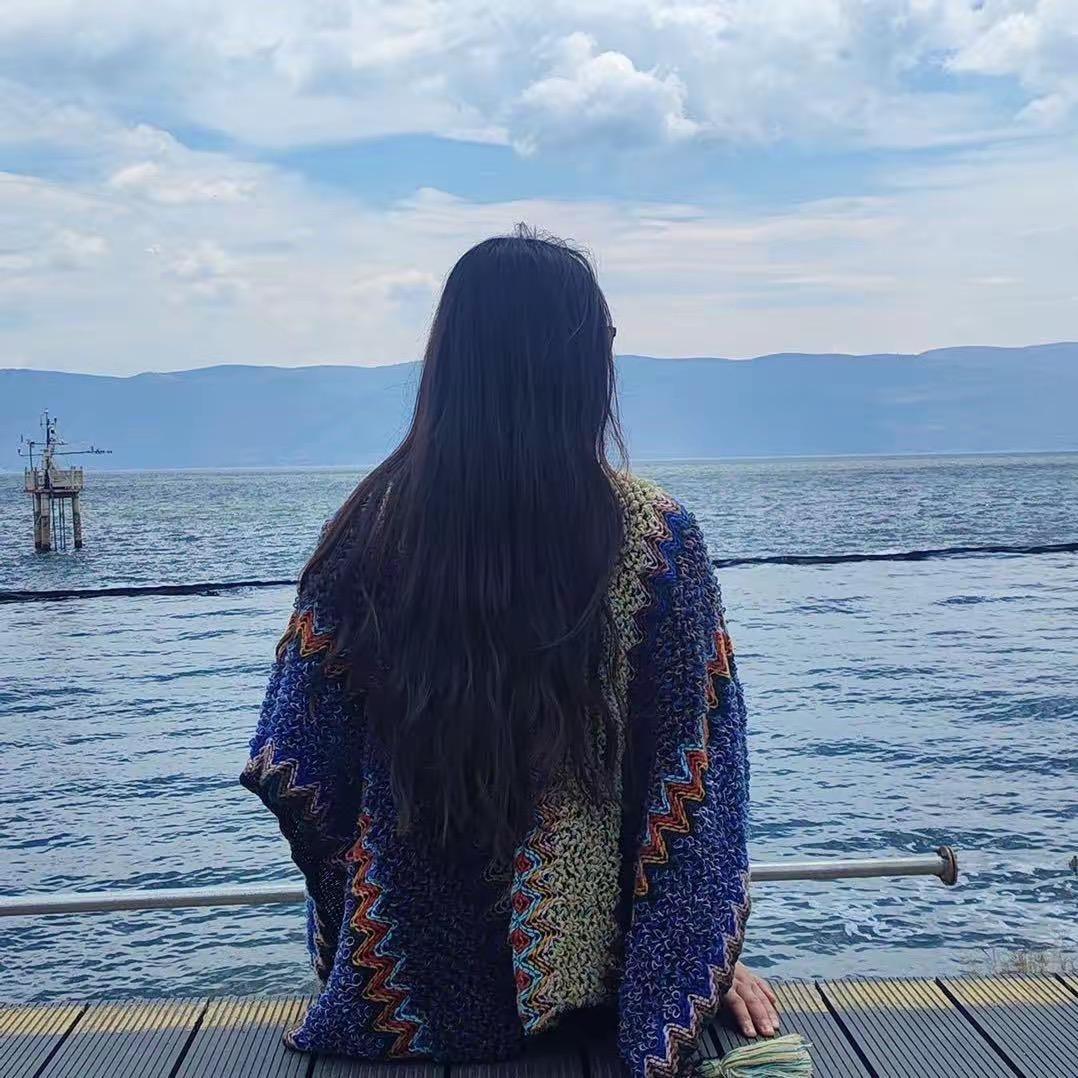 譚小娟/