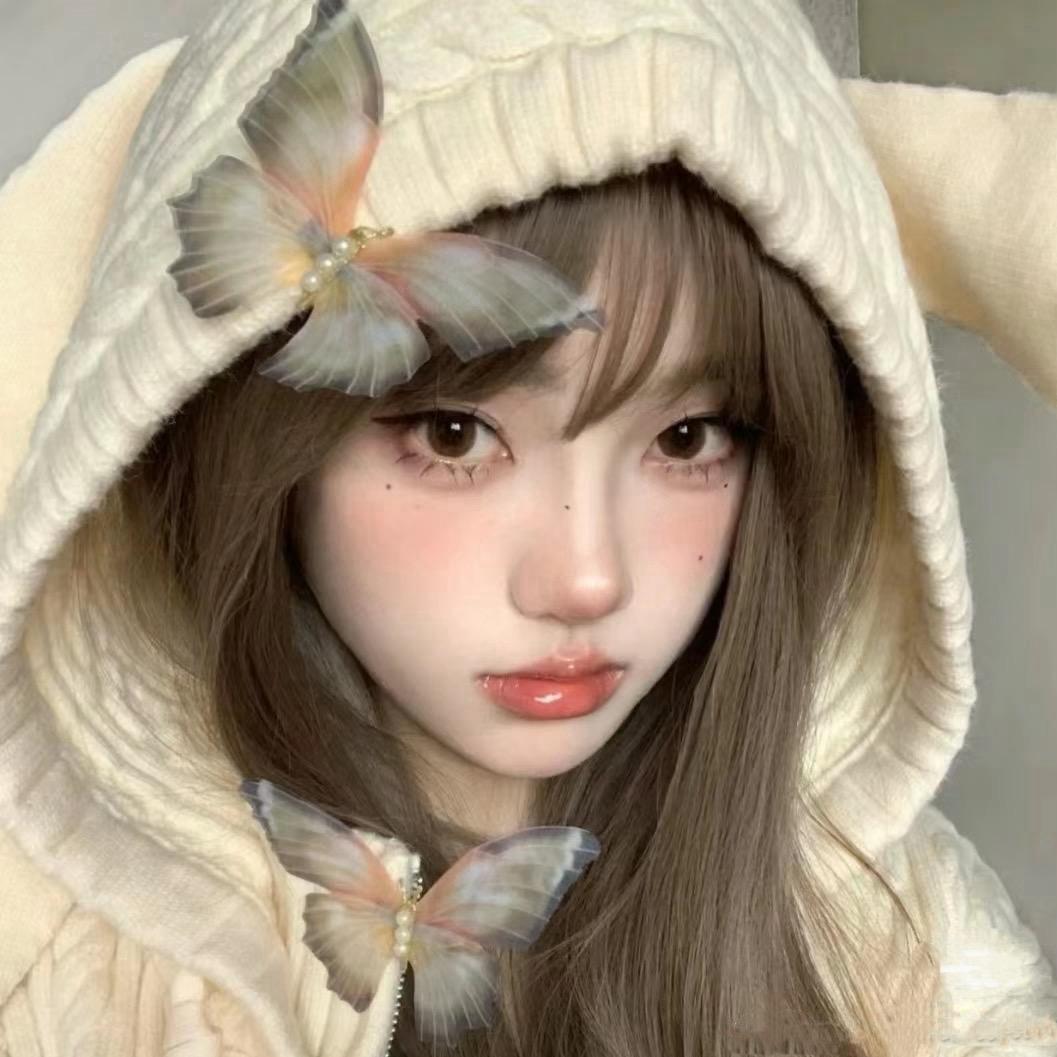 L.