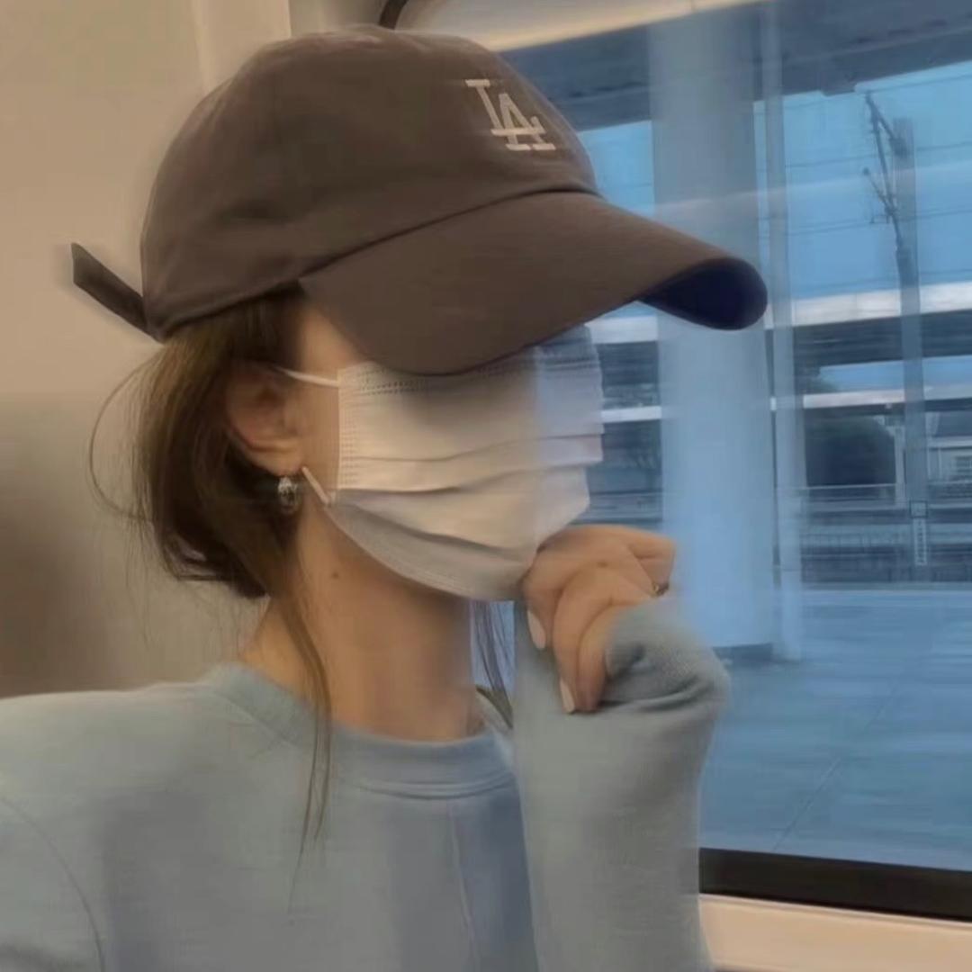 困困^