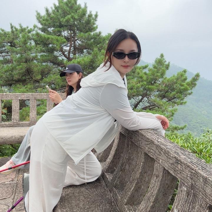 张得美