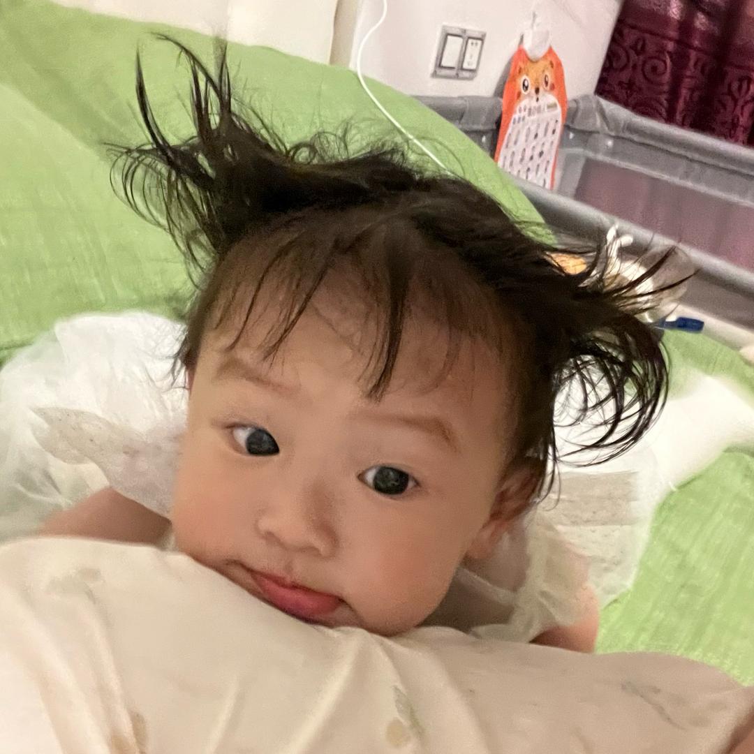 张殷清依