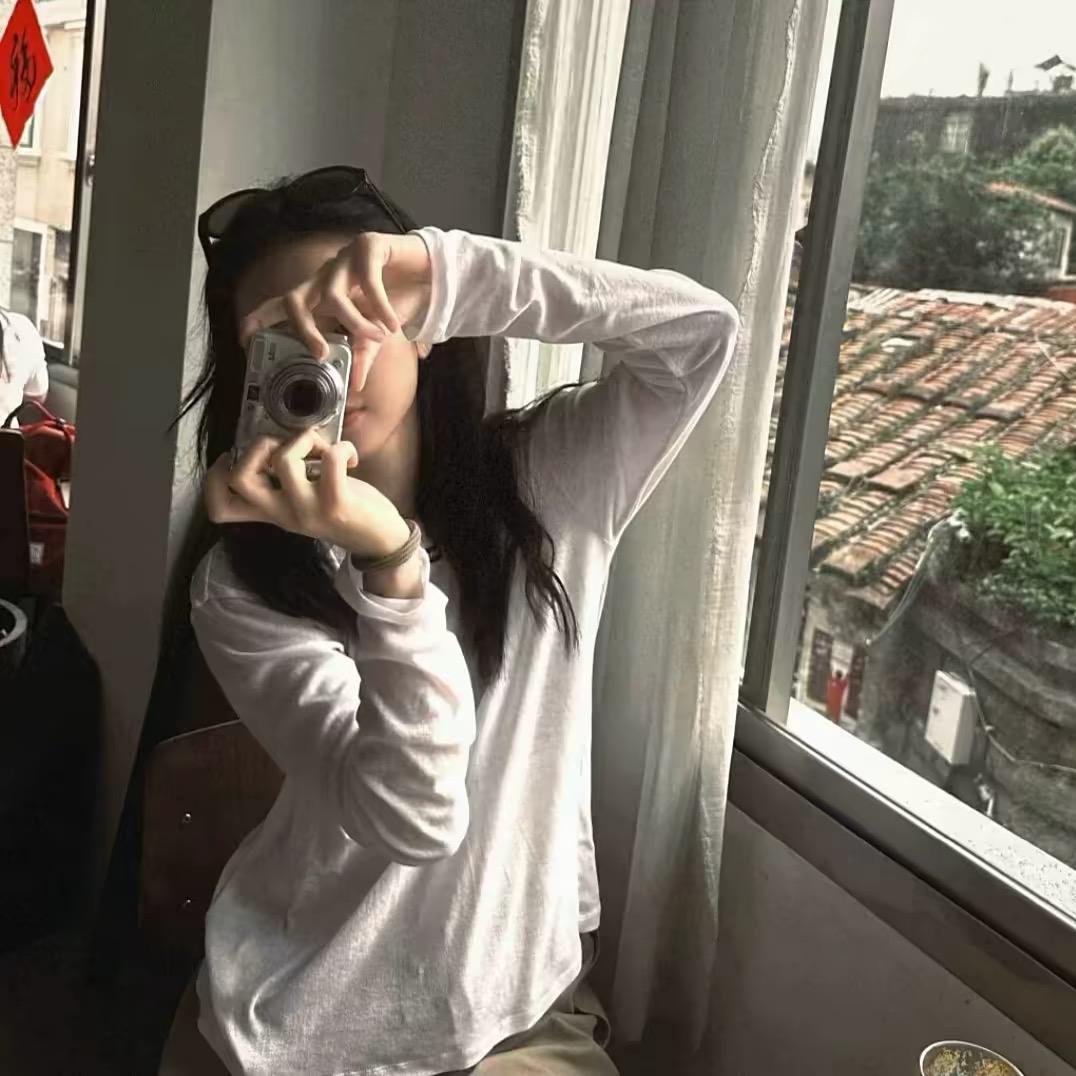 小青.