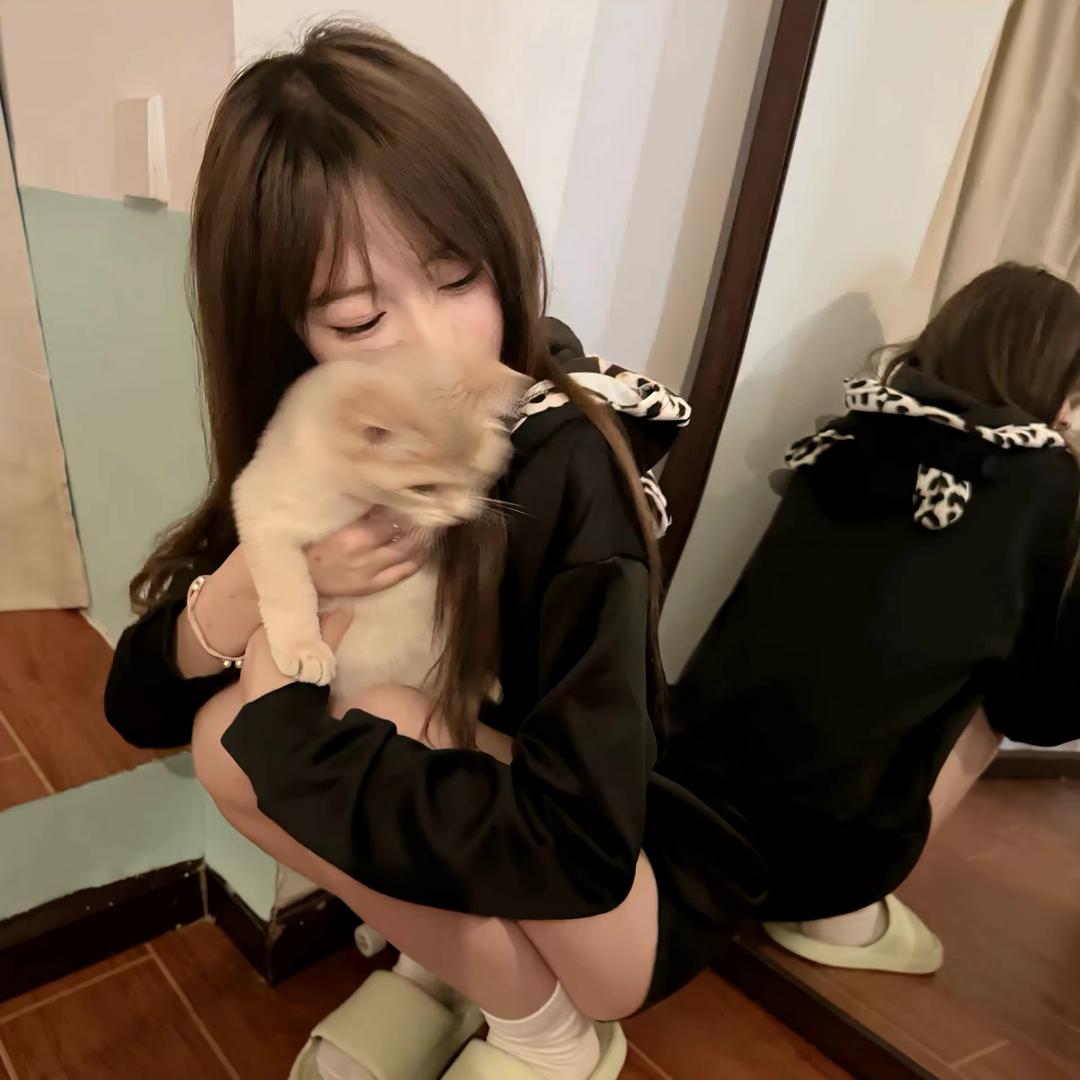 摇摇^