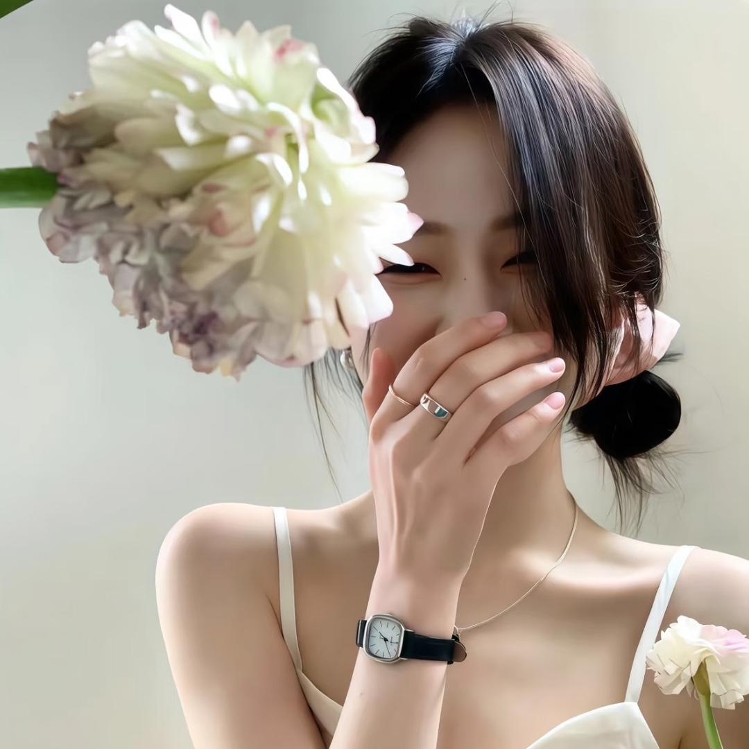媛.