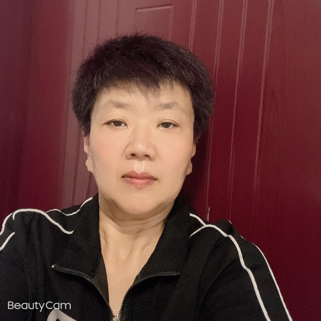 张育新