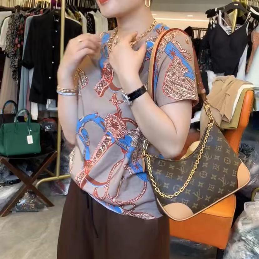 梧辰艾服饰店晶JING女装