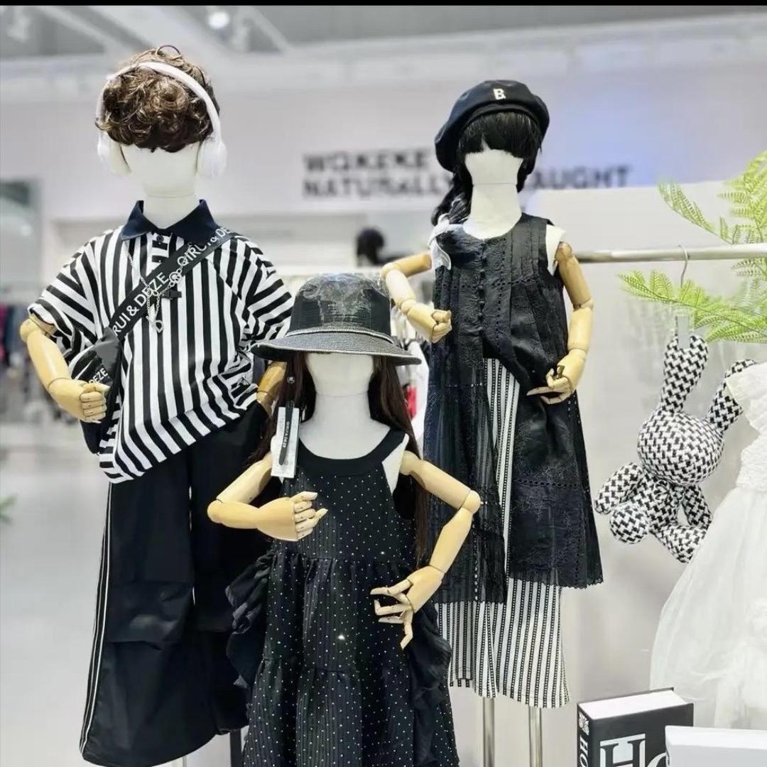 安溪县长坑迎雪童装店