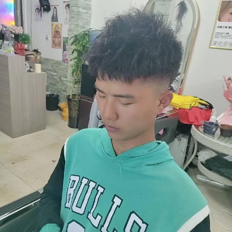 七七