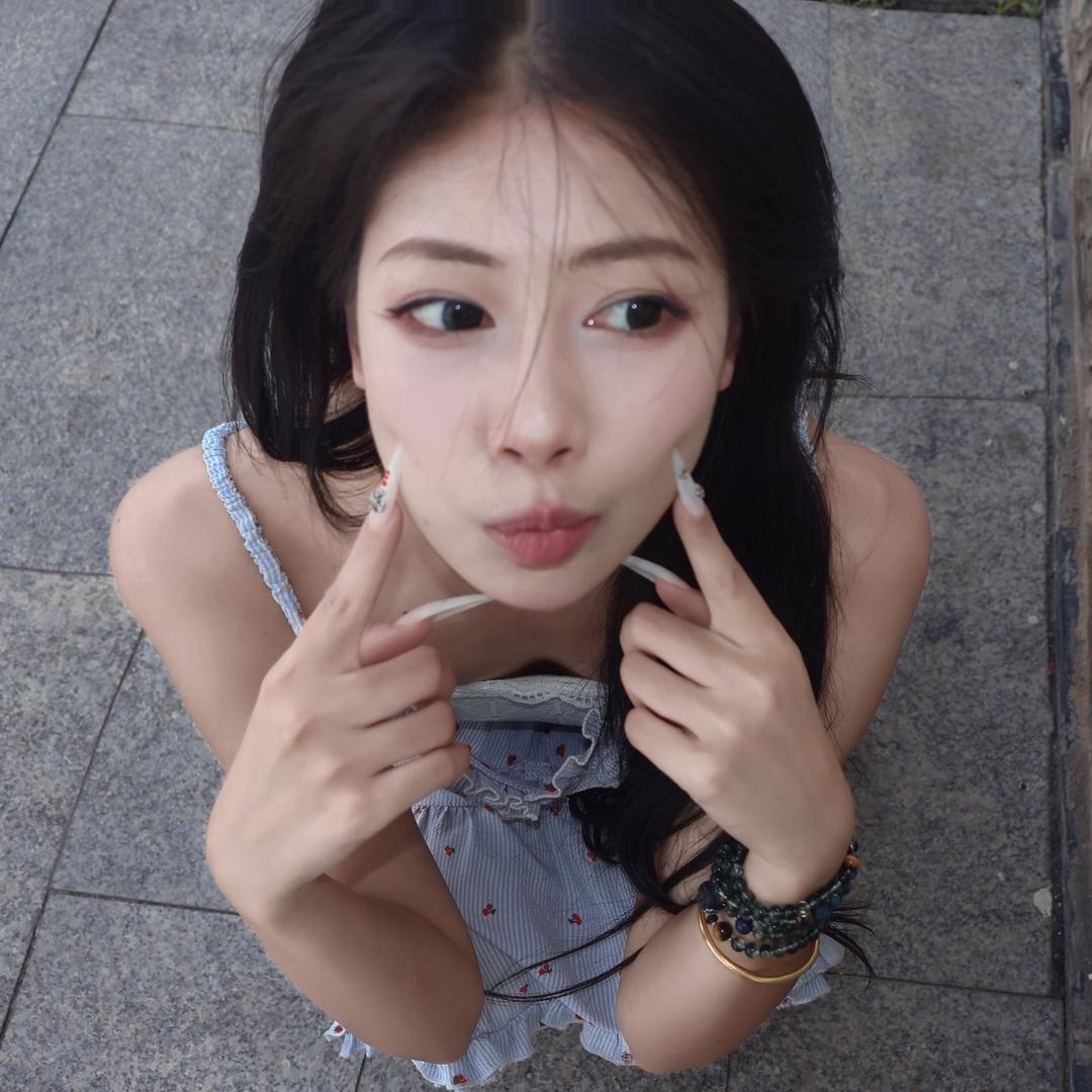 哦