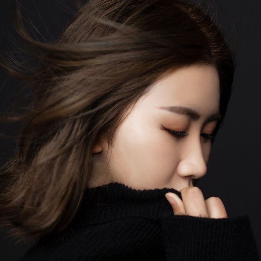 娜子.