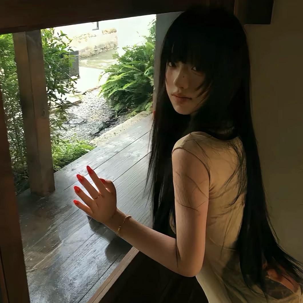 77^