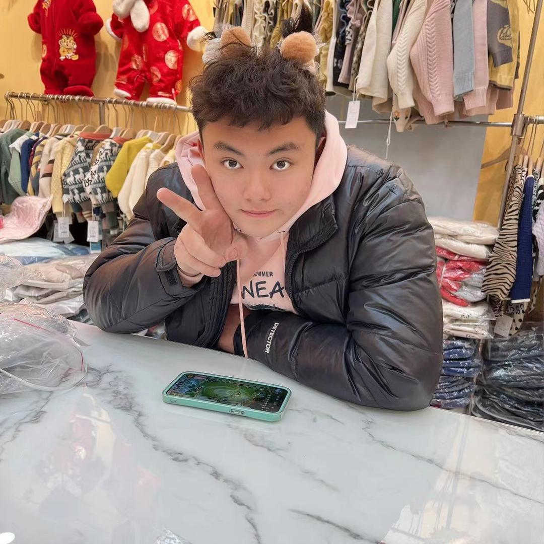 政毅童装店