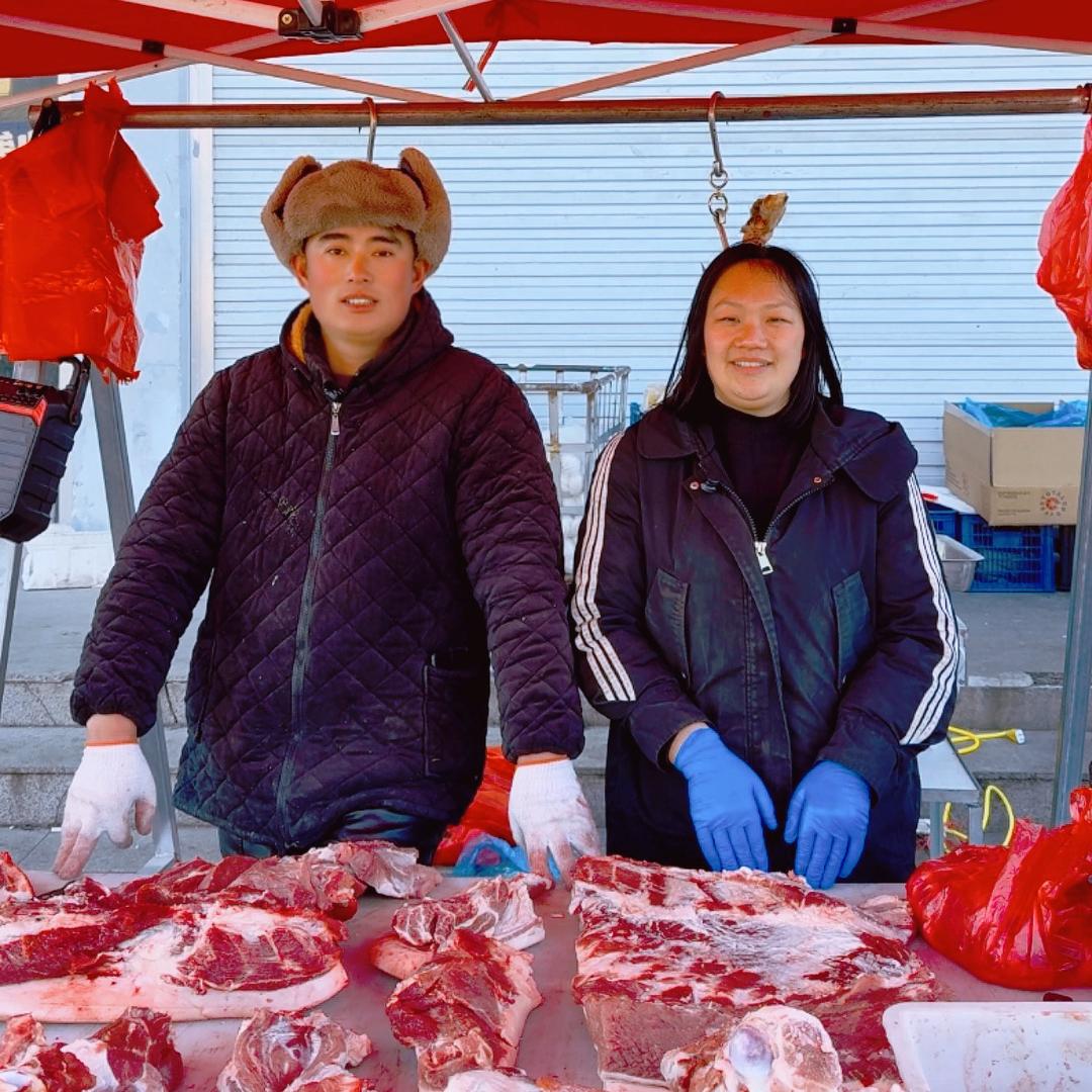 西湖卖肉的两口子