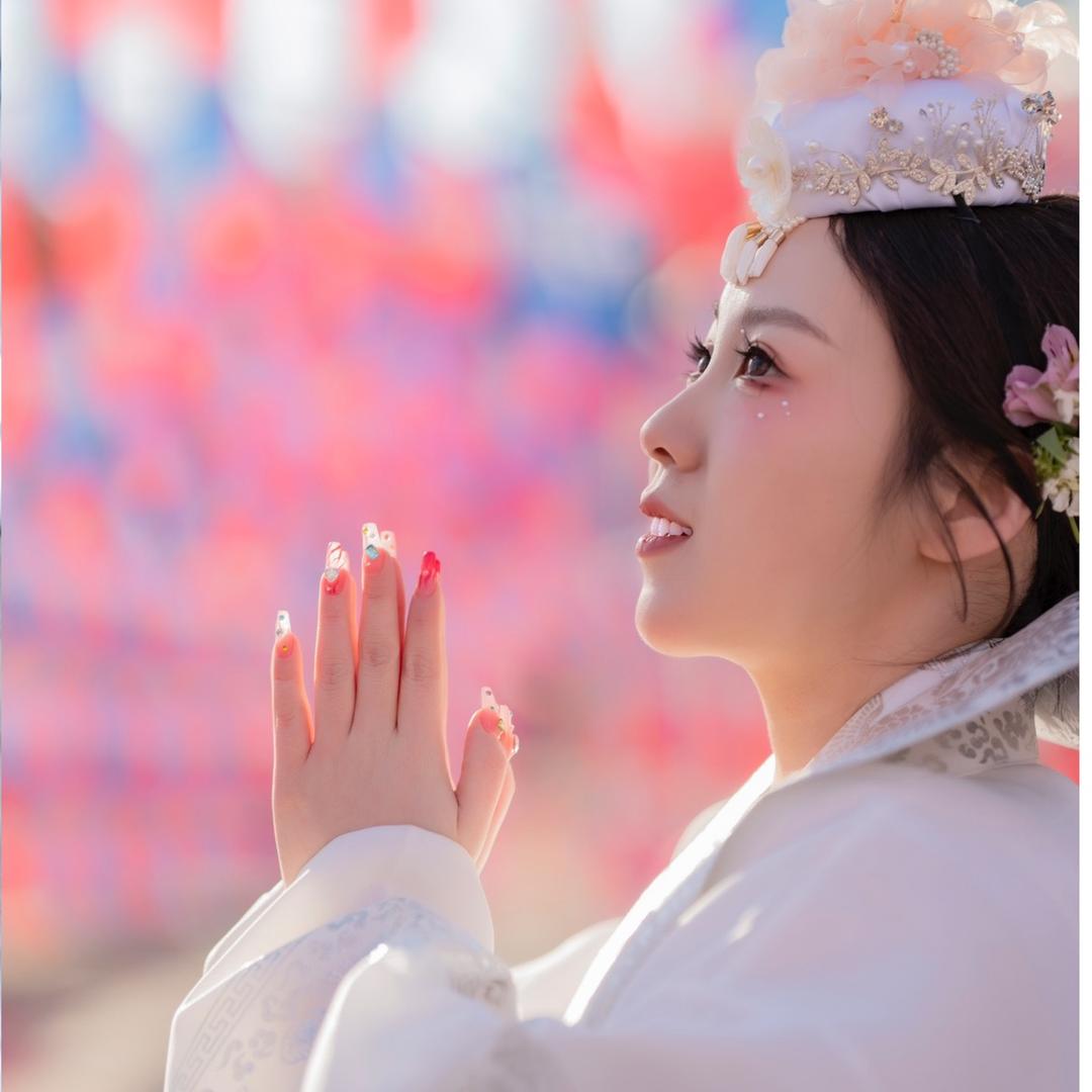 美啦民俗服饰摄影馆官方号