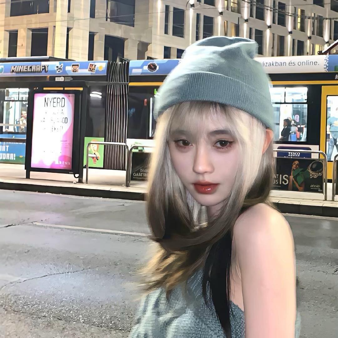 哈 尼.