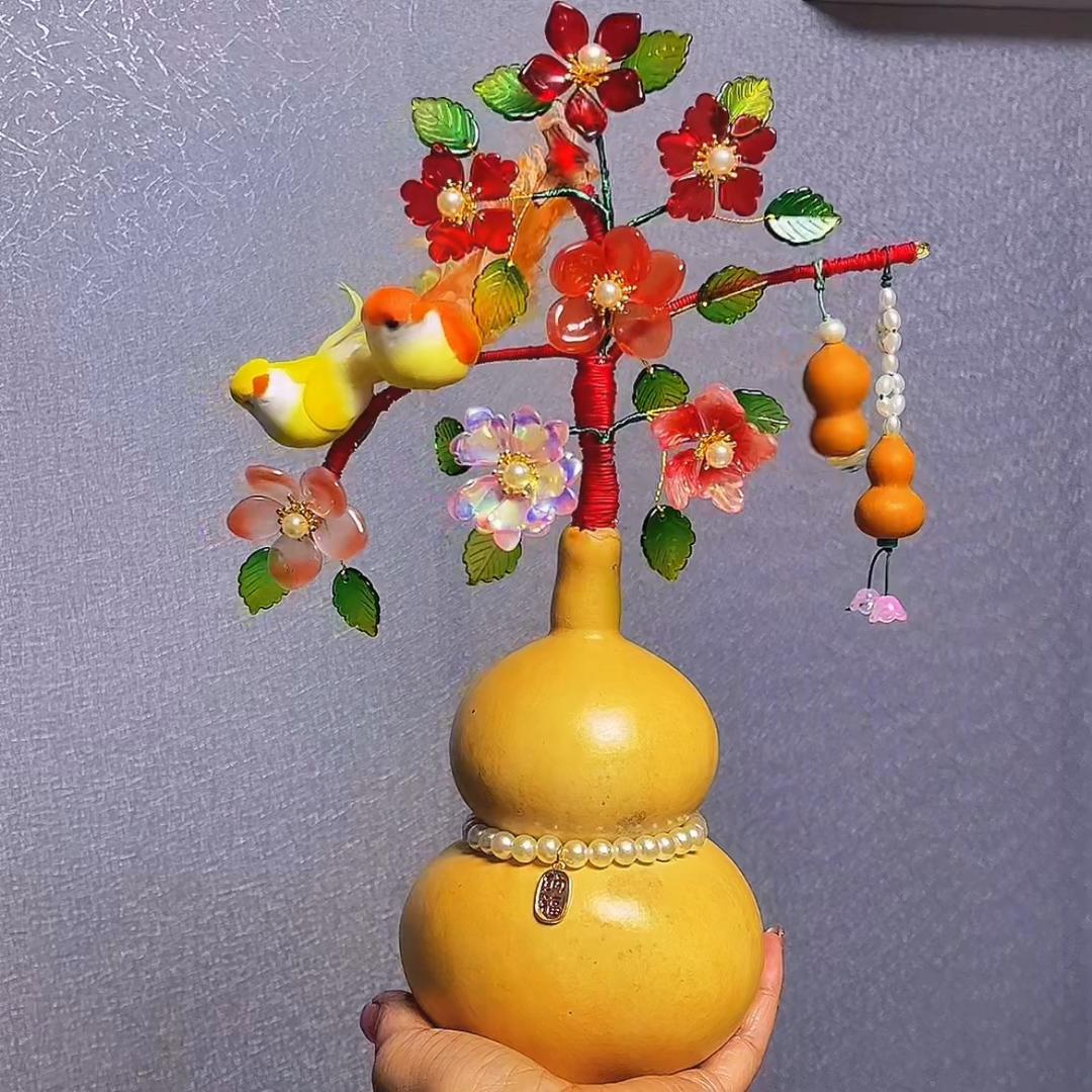 一葫纤金