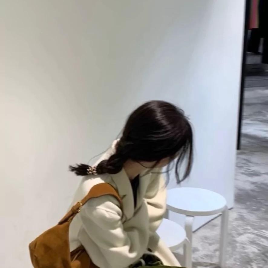 L.