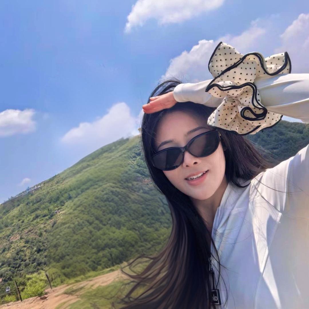 橙子.