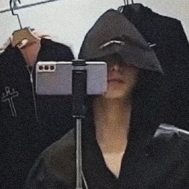 M.