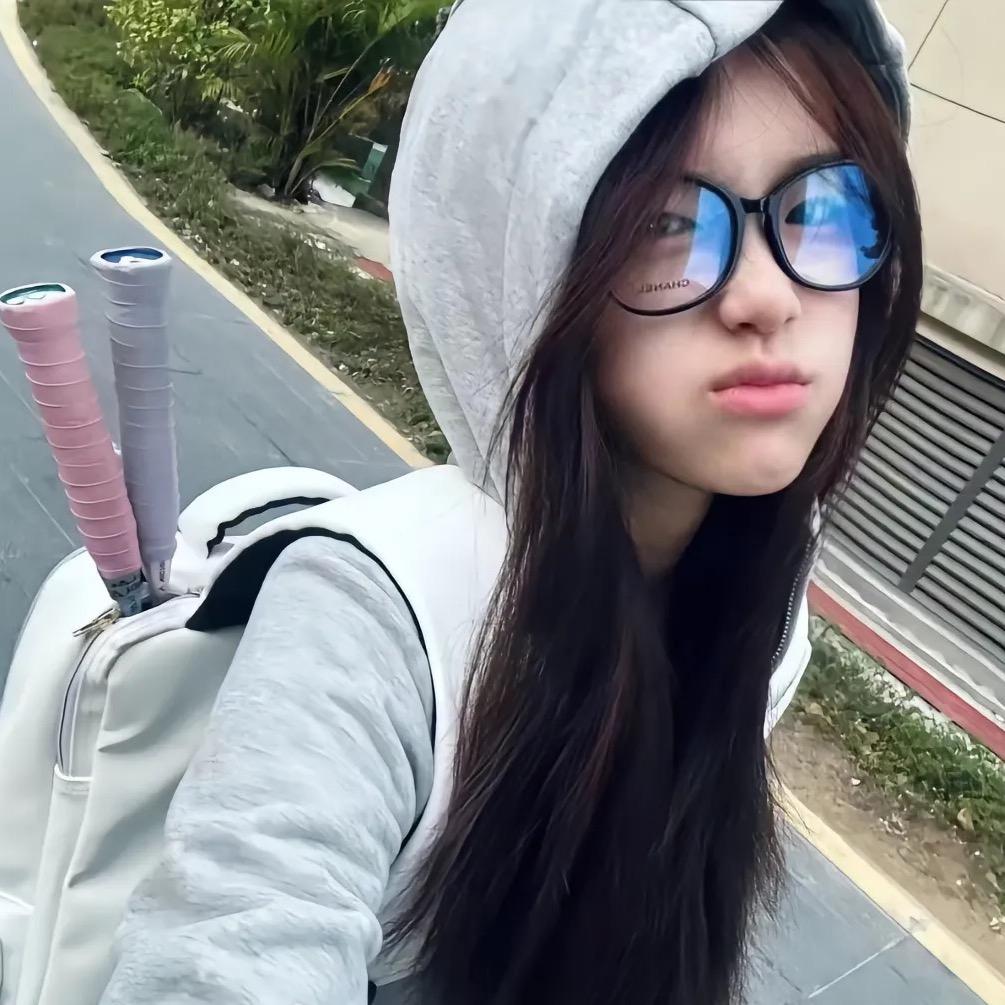 “：”