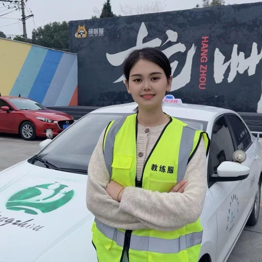 领驾猫驾校（李校长和朱教练）