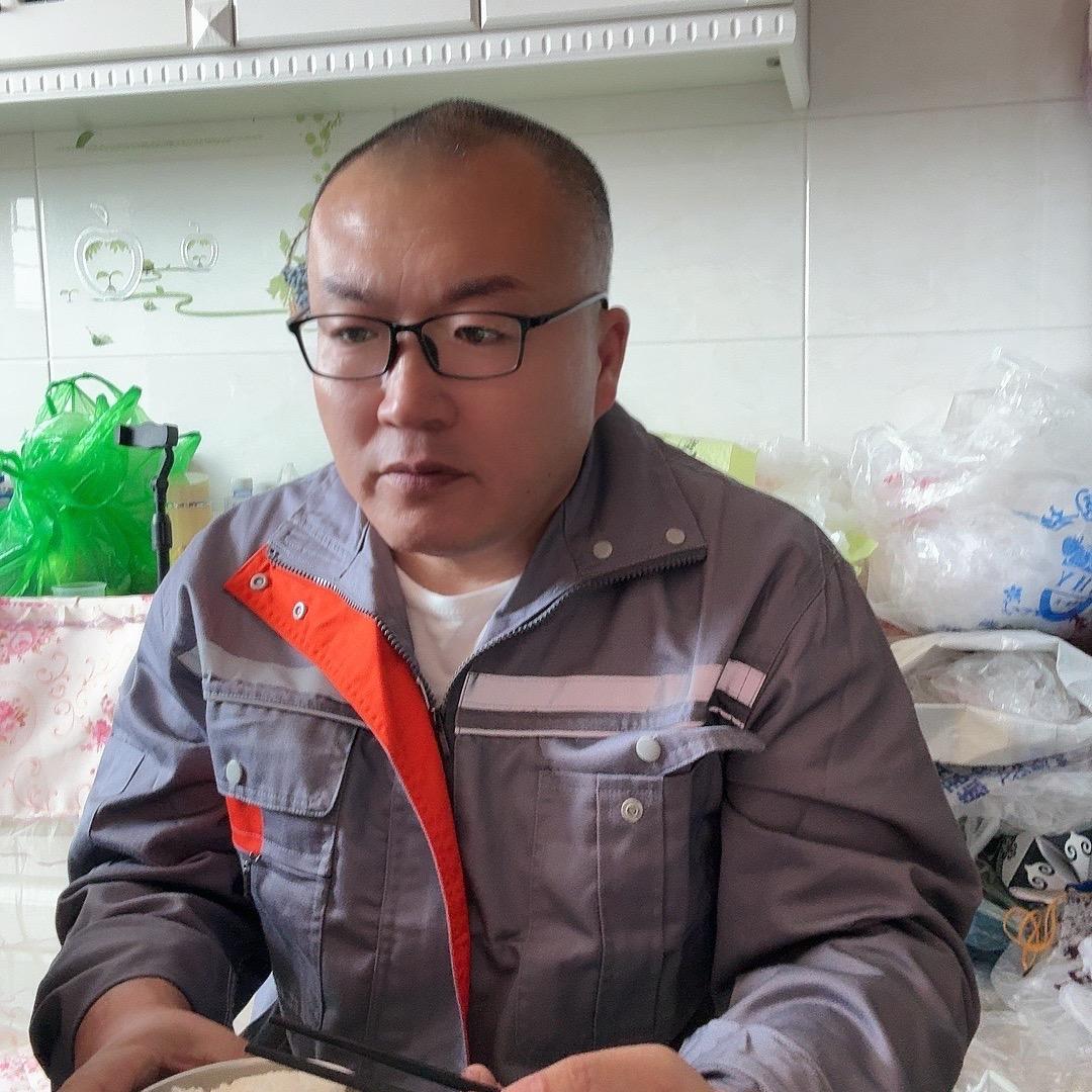 哲哲爸