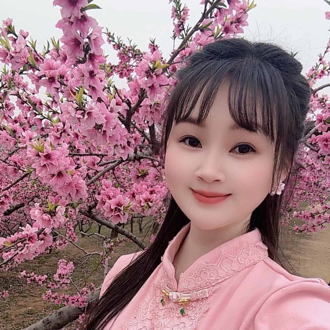 @丽