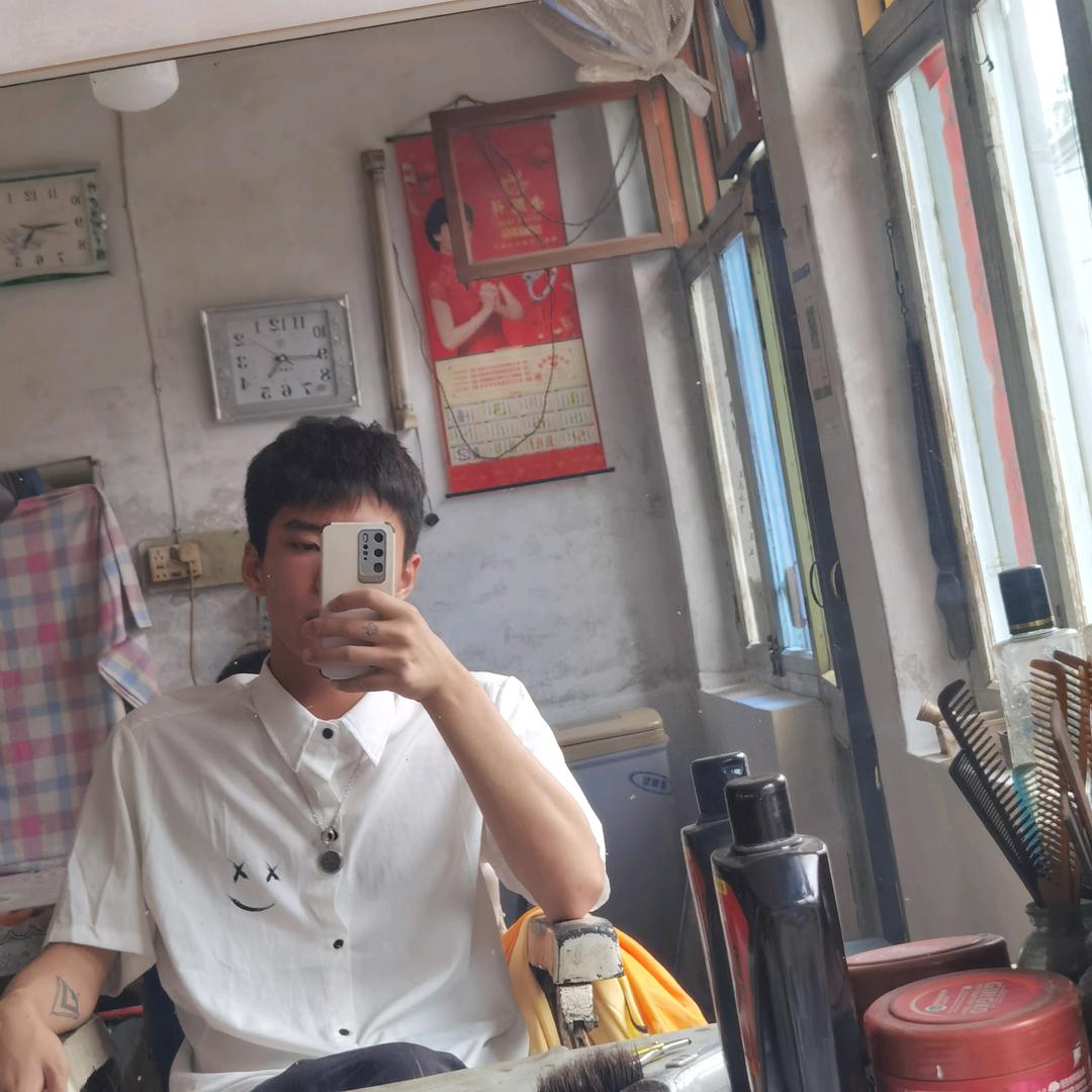 张丶