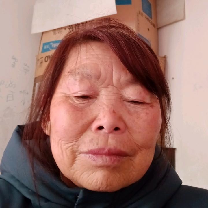 倪以美