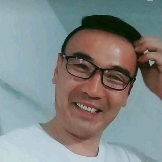 伟美一笑