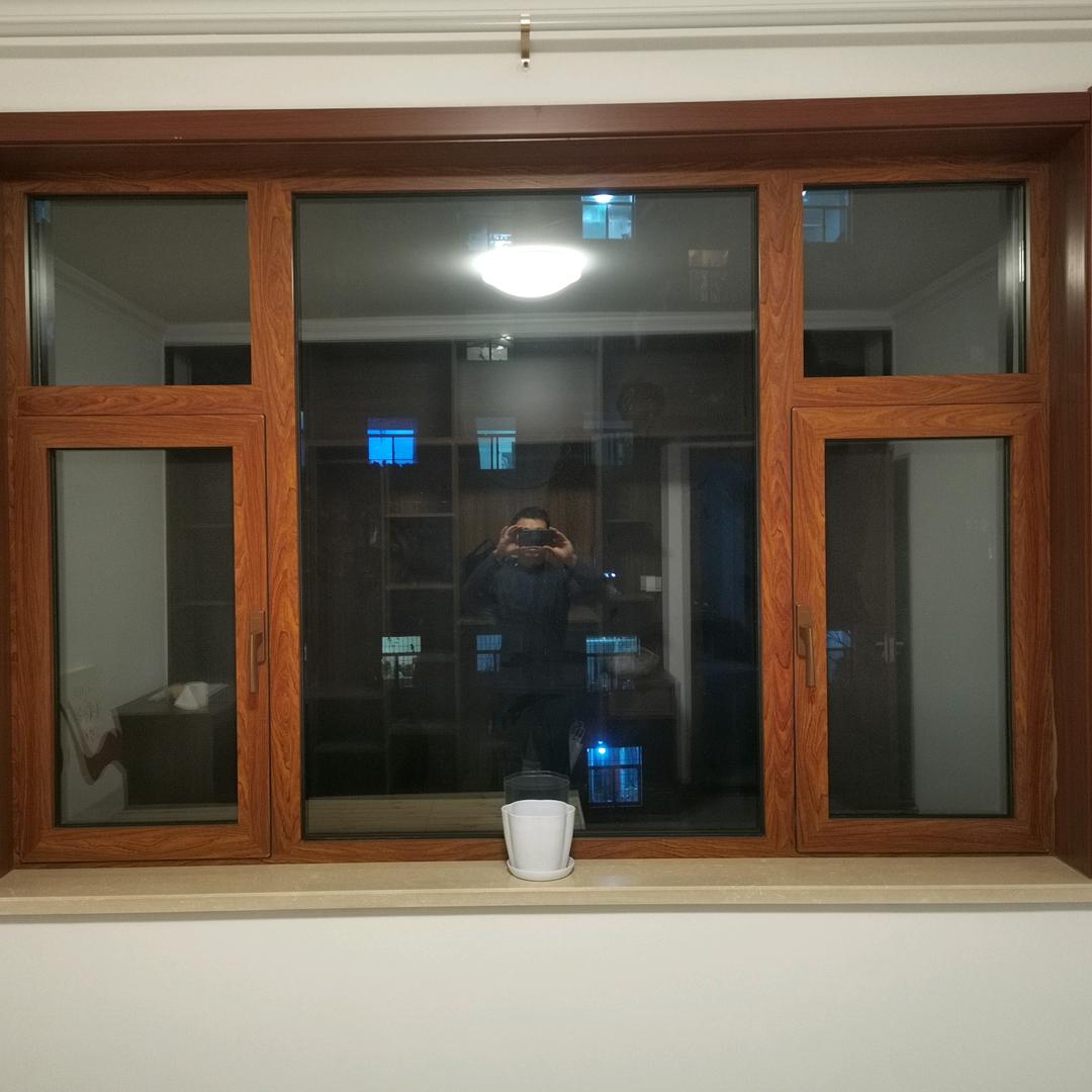 小峰专业制作断桥门窗阳光房