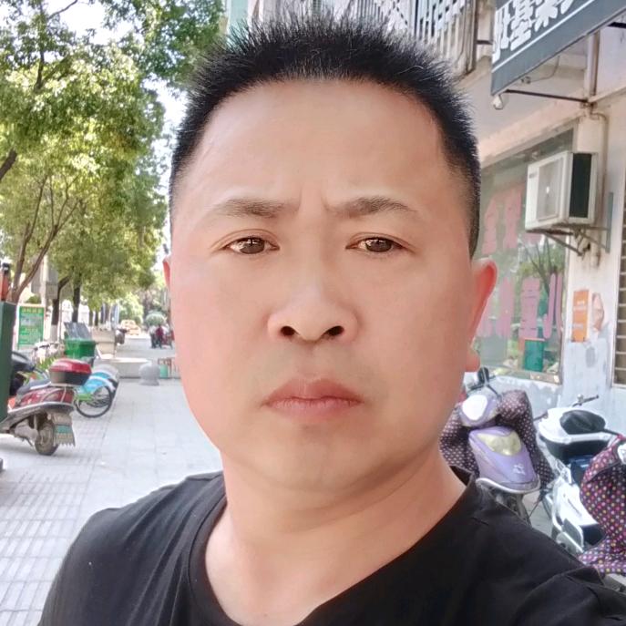 光辉哥