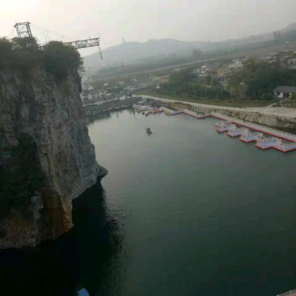 劉