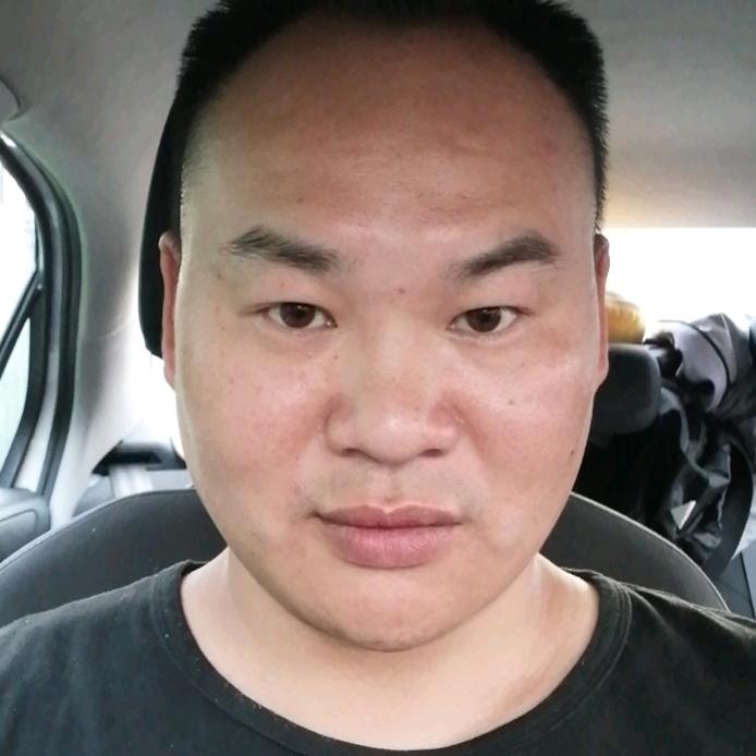 在长沙望岳考场做教练的益阳人