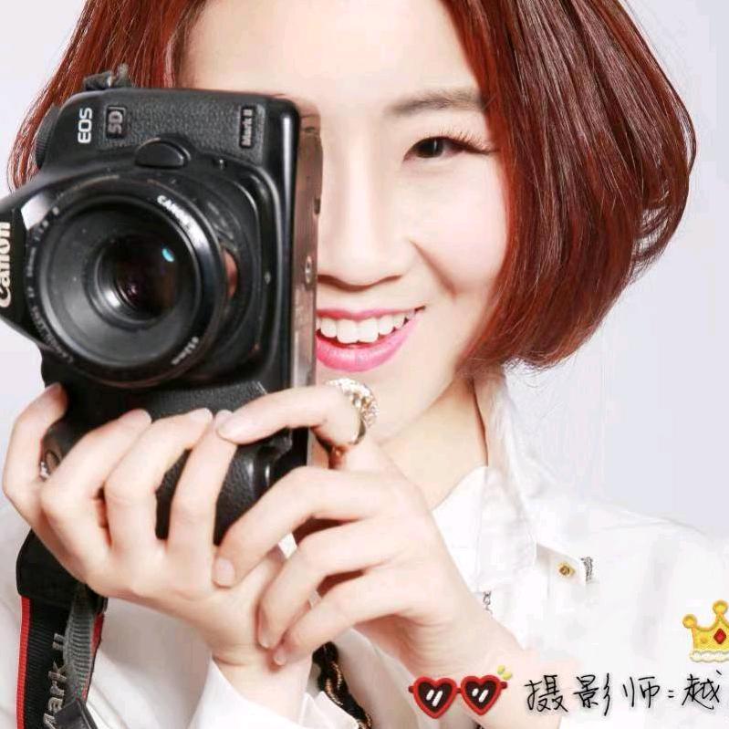 女摄影师越越