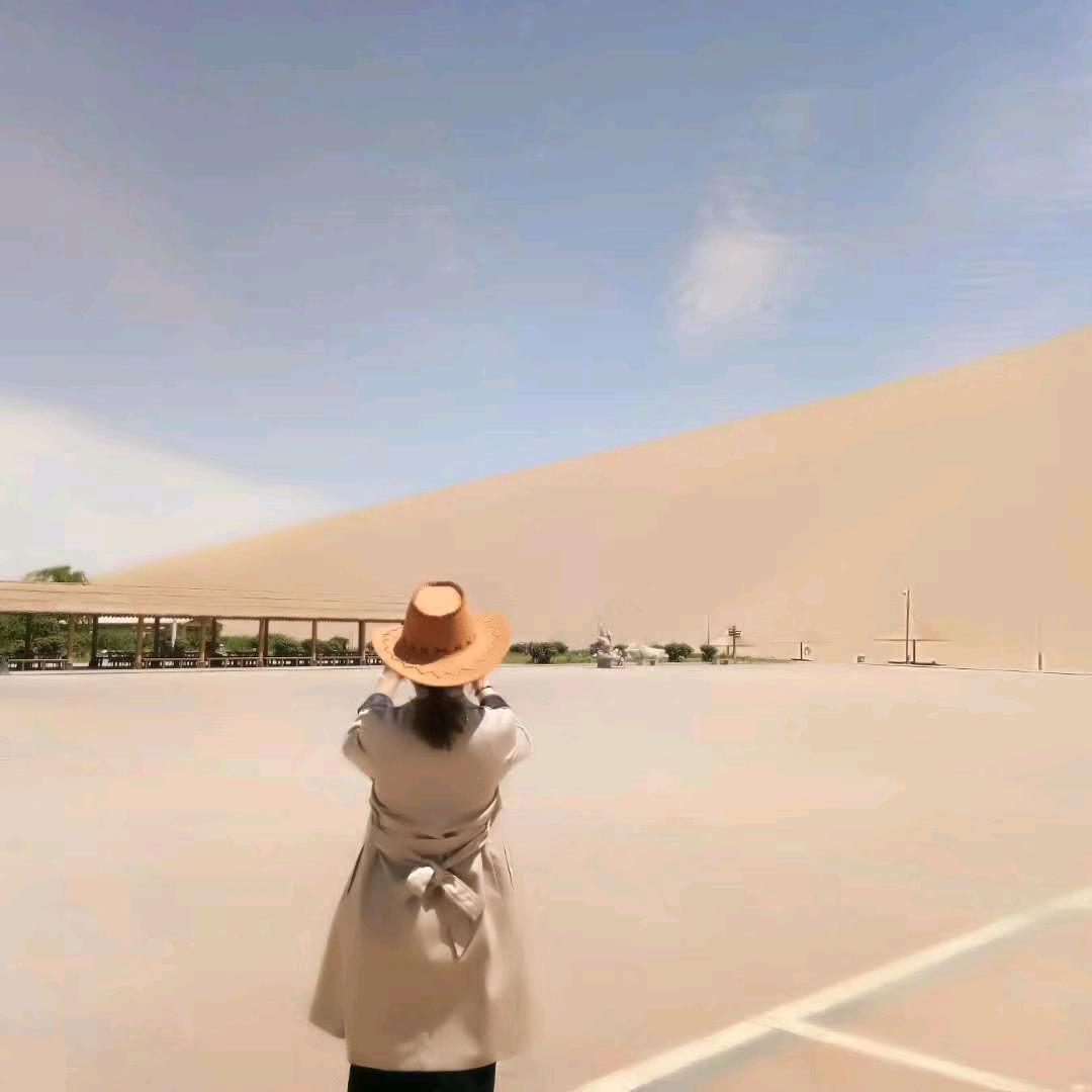 玫子.