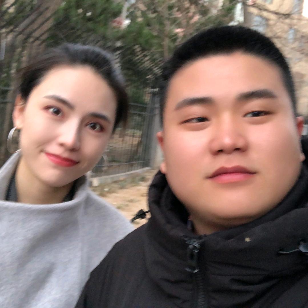 张某