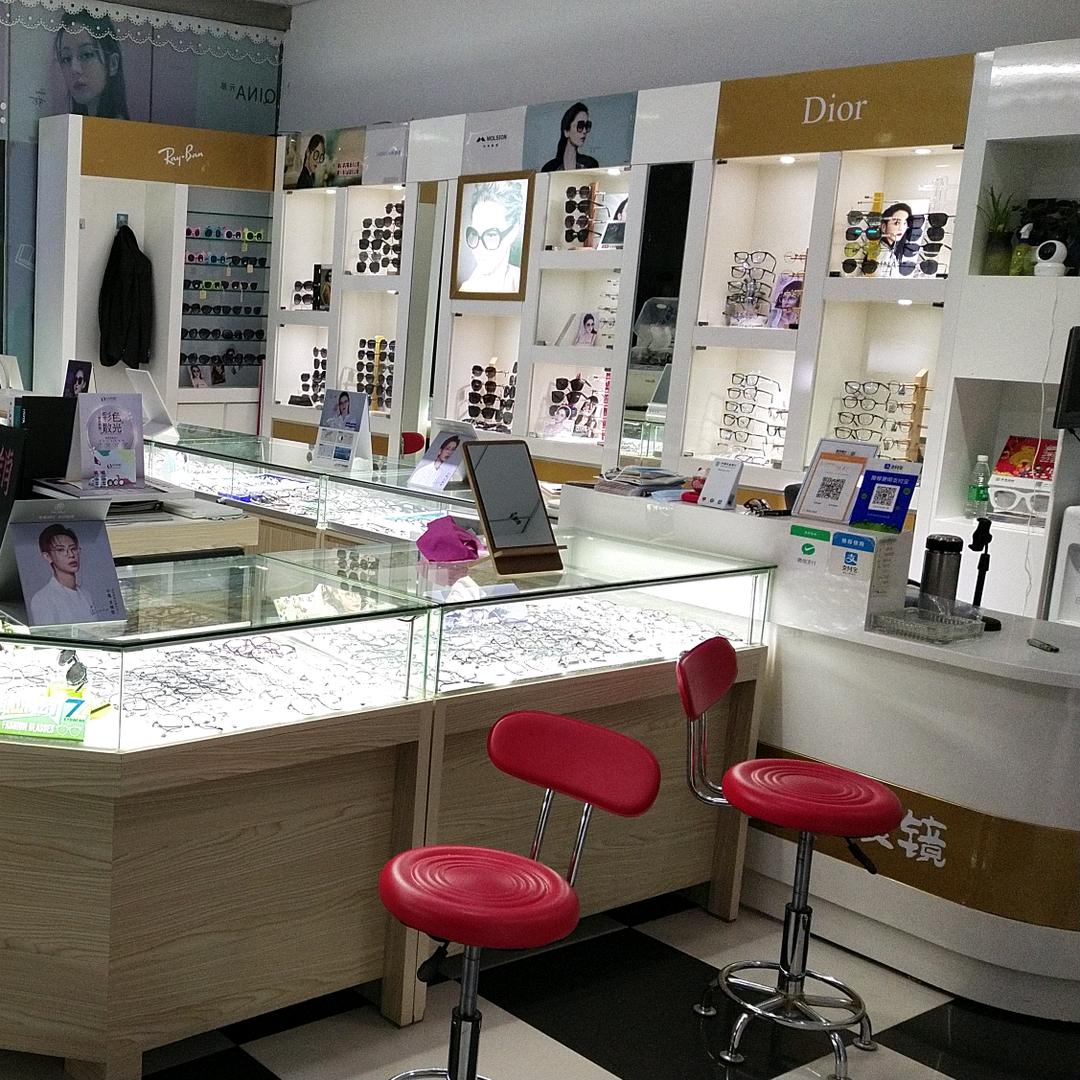 金晶亮 眼镜分店:蝴蝶广场东门蝴蝶花店进